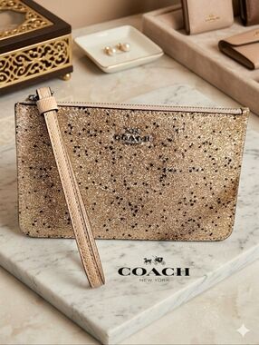 Coach Glitter Star Wristlet
